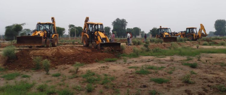 यूआईटी द्वारा अवैध प्लॉटिंग के विरूद्ध कार्रवाई कर कृषि भूमि पर से हटाया अतिक्रमण 