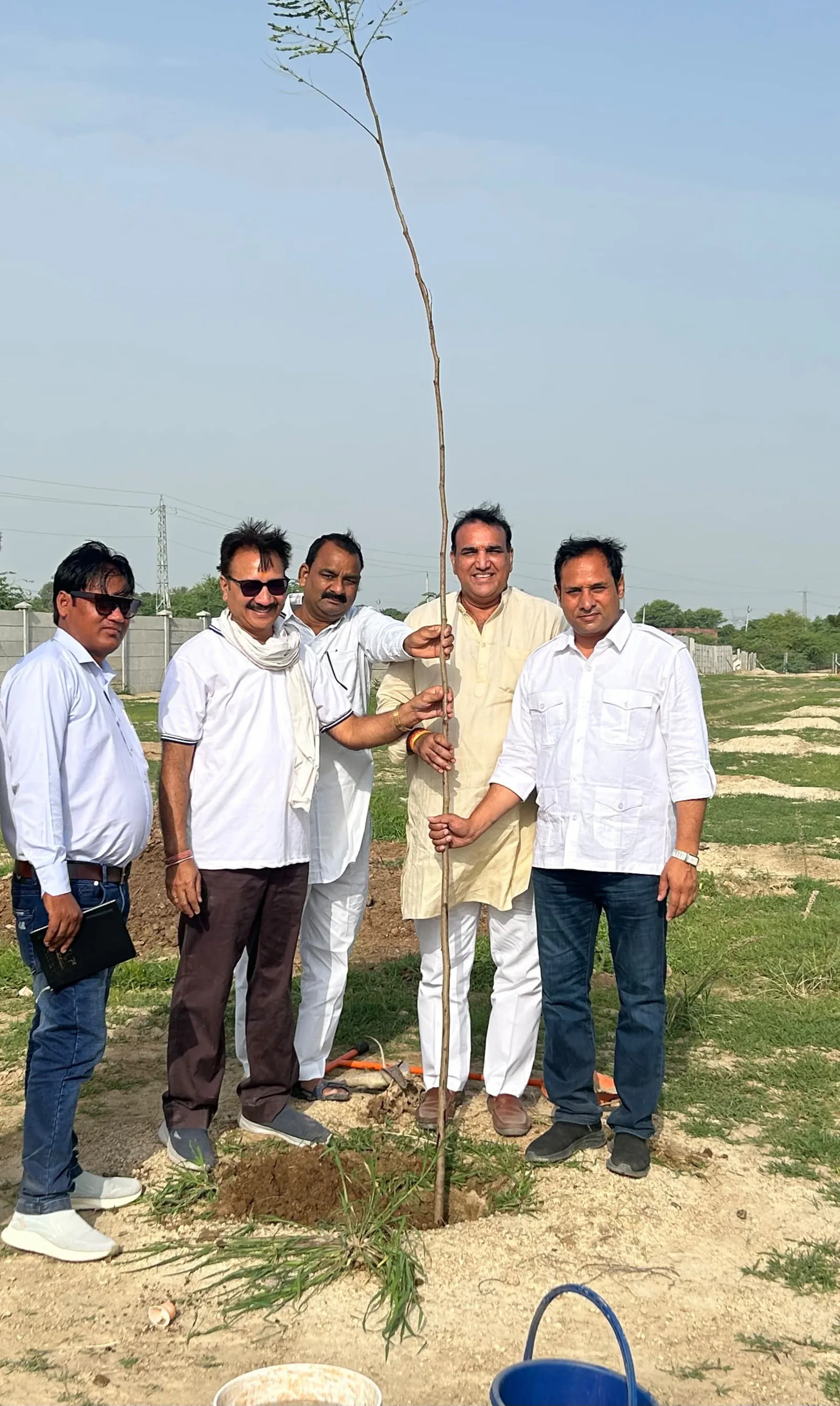 गौनंदी धाम गौशाला में 121 आम सहित विभिन्न प्रजातियों के पौधे लगाए, 11 वर्षों तक संरक्षण का लिया संकल्प गुप्त नवरात्र स्थापना पर आयोजित हुआ पौधारोपण कार्यक्रम, डॉ. गोरधन लाल शर्मा ने जन्मदिन पर लगाई पंचवटी
